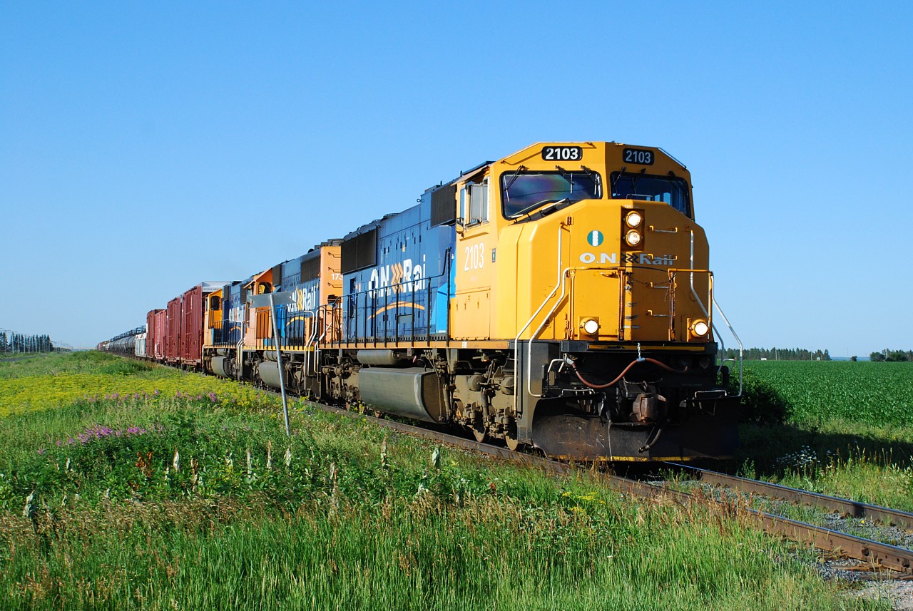 Arnold's photo that he recently posted taken in Earlton from the Hwy. 11 bridge showing the unusual geography reminded me of this photo I had taken there a few concession roads to the north.  I too found it strange that this flat farm land exists in northern Ontario.  It's sure not the typical landscape we're used to seeing Ontario Northland operating in.  I need to get back up there.