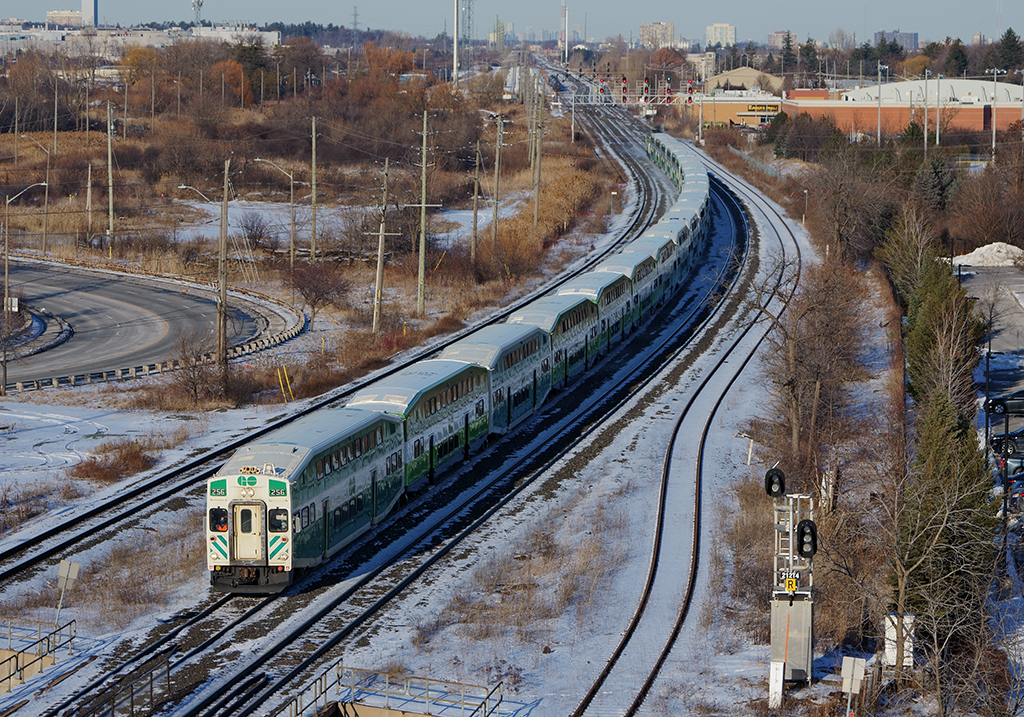 Not often does GO Transit run equipment trains at this length (L21), but with the pandemic loads of bilevels were stored through out the GO Transit network from the start of 2020 onward. The morning equipment train to Willowbrook which handled a 23 car consist with 668 solo is running is now back from Willowbrook in Toronto to Lewis Yard off the CN Grimsby Sub with an old school cabcar leader and 668 once again pushing hard on the rear as the train rolls through Oakville GO Station.