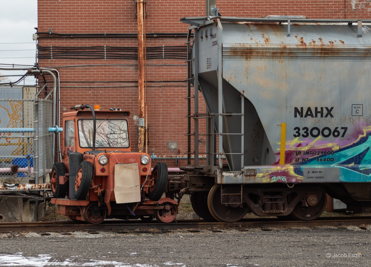I was walking through Area H on my way home and discovered this beauty sitting in the back of the KOREX plant at the end of Area H. You sure don't come by these to often especially in my neighbourhood! Let me know if you have any information about this thing!