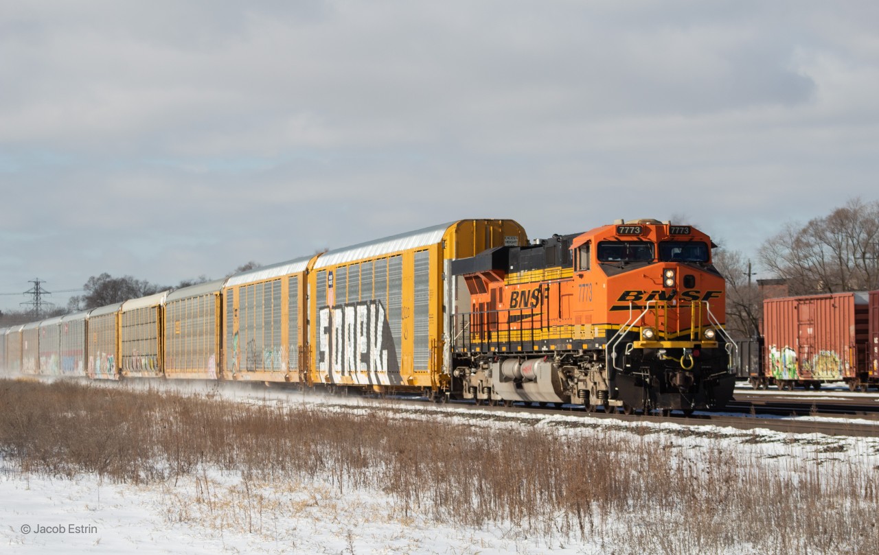 CP 244 passes through West Toronto with BNSF 7773 in the lead on the approach to Osler where it will have to stop and wait for a GO Train to clear Davenport.