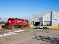 CP TH11 is pictured at MANA (former Stelco Rod Mill) in Hamilton, lifting a long string of gons out of the western most track into the building. CP was going to MANA quite a bit in December, and it was the first time I had seen them there in a couple of years. The traffic all for CSX I assume, given it was all CSX gons. I got <a href="http://www.railpictures.ca/?attachment_id=44215" target="_blank">CN here a month or so later </a> - just one of the many industries in the north end of Hamilton visited by both.