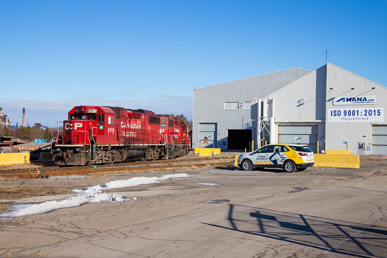 CP TH11 is pictured at MANA (former Stelco Rod Mill) in Hamilton, lifting a long string of gons out of the western most track into the building. CP was going to MANA quite a bit in December, and it was the first time I had seen them there in a couple of years. The traffic all for CSX I assume, given it was all CSX gons. I got CN here a month or so later  - just one of the many industries in the north end of Hamilton visited by both.