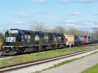 C93 has just arrived in Fort Erie and is pulling ahead to clear the switch so that they can shove back into the south side of the yard to make their set off for CN. In a <a href="http://www.railpictures.ca/?attachment_id=41281" target="_blank">move that is now largely the realm of SD40Es</a>, it's a treat to get an SD40-2 lead on C93 these days. A short while later, CN L561 would return from Buffalo and lift the setoff from NS, shown <a href="http://www.railpictures.ca/?attachment_id=43872" target="_blank">here</a>.
