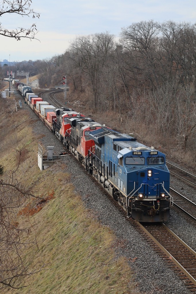 A decent end to a forgettable year. While I have caught a few of the somewhat unique Tier 4 GECX leased units over the past few years, now owned by CN. It would take me until today to finally catch one in the lead. Unfortunately most have been repainted and lost they're so called "hunch back" appearance, making them look more like traditional Tier 4 GE's. After a bit of a delay in Hamilton, train 422 is on the move again as it heads for Aldershot and Toronto with GECX 2038 in the lead on the last day of 2020.