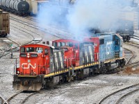 This is definitely a lash up I figured I would never see, but lately it seems anything is possible. Hamilton yard lately has become an interesting place to catch the unexpected. A few years ago it seemed we had most likely seen the end for CN's unique GMD-1's, but thankfully, especially in Southern Ontario that isn't the case. I'm not complaining about GTW painted units adding some colour to the sea of black on CN either. Here we see a pretty unique consist throttling up and heading into the yard to grab another cut of cars, while adding to Hamilton's fresh and clean air, LOL!