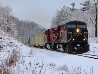 I don't spend the time I used to on the Hamilton subdivision but usually when I do the scenery typically impresses me more then the train itself. It is amazing how the higher elevation on top of the Niagara Escarpment can create much different photos then those at the bottom. While chasing a very short 247 from Hamilton I got word that one of CN's IC "Blue Devil" Dash-8's was in the consist. Unfortunately it was dropped at Lambton, but the lead unit here could almost pass for an IC unit, LOL! While the snow cover was very little in Hamilton, the scene here near Guelph Junction was much more impressive. 