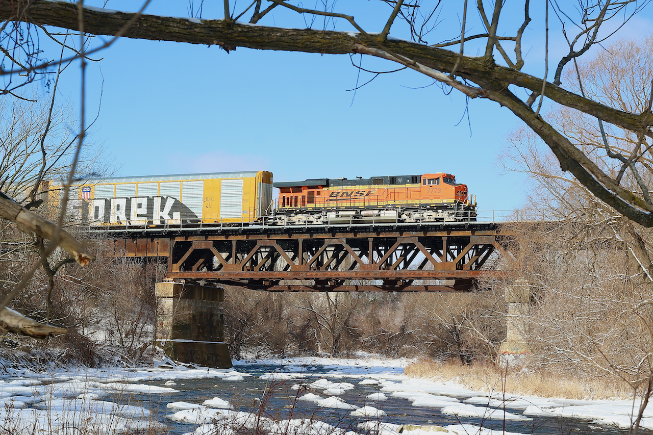 The minus 19 windchill was worth bearing considering the motive power. After a quick stop at Hornby yard, CP train 244 is on the move again as it cruises over the Credit River.