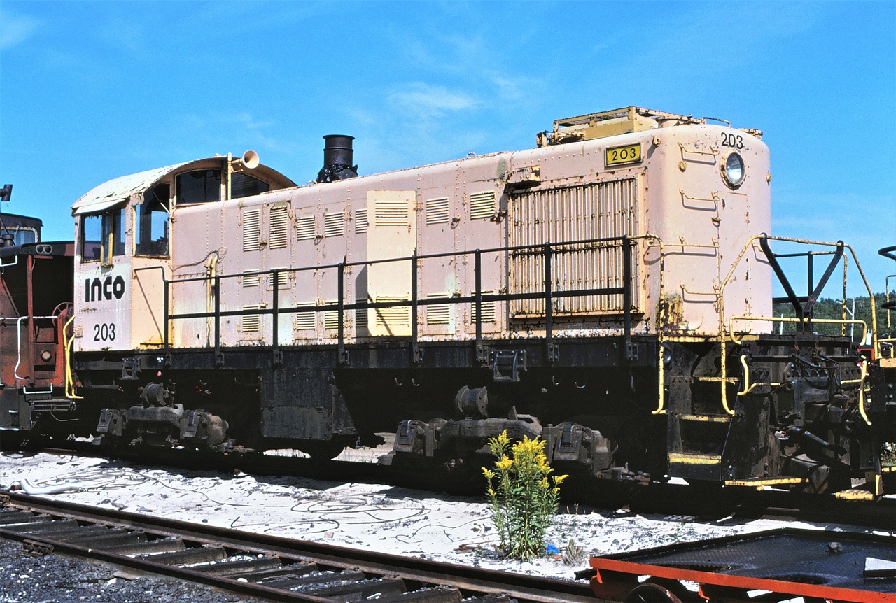 INCO Alco S-2 switcher # 203 is shown resting, or rusting, away behind the NRE facility in Capreol, Ontario in August 2010.  # 203 began life as Western Maryland 144 in December 1946, then to CIL in 1967, then to INCO in 1983, and finally donated to the Northern Ontario Railway Museum in Capreol in 1998.  It appears that the unit never made it to the museum property and I am not certain of the final disposition of the unit.