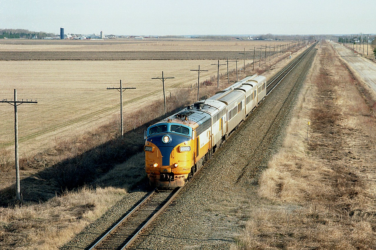 To many it is surprising that the "North" could look like a southern farm setting in some areas. But here is proof that around Earlton it is just that.  I'm on the Highway 11 overpass just a little bit out of town and have caught the morning Northlander making its' way south to Toronto. The train has just left the modern station at Englehart behind ONR 2000 and 204. Next stop is another modern station at New Liskeard. And yes, there is a renovated stop at Temagami, and another new station at North Bay. It doesn't matter though. The Ontario liberal government killed this train in 2012. The current government says it will bring it back, but I am not holding my breath.
