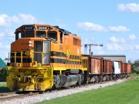 RLHH 3049 reversing through Cainsville on the way to reload with ballast at Hagersville. They had been dumping up towards Simpson on this particular day