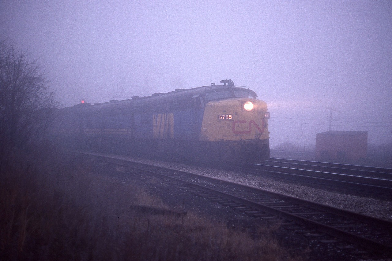 I guess if you are going to see something you like, any type weather day is a good day. I fail to recall why I bothered to make the trip so early in the morning to Bayview in such dreary conditions though.  Came away with what I think was a decent "mood" picture.  Here is VIA(CN) 6765 leading a westbound up onto the Dundas sub on what is obviously a damp and cold morning as well as foggy, considering this is mid-November.
This might be morning train #71; weather cleared  for possible CP Mississauga Wreck detour trains later that day. Sometimes in anticipation of seeing something, you just went out and hoped. No real communications like todays internet.
Fortunately this old MLW FPA-4 has been saved. It is a resident of Exporail  at Saint-Constant, Quebec.