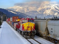 Wearing WC colours, CN ET44AC 3069 eases train Q102 out of the north yard at Jasper.