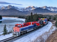 Painted in BC Rail heritage colours, CN ET44AC 3115 leads Kamloops-Montreal train X108 eastward alongside the Athabasca River between Swan Landing and Solomon on CN's Edson Sub.