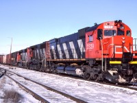 Peter Jobe photographed CN 2329 with train #396 at Maple, Ontario on December 13, 1986.