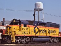  <br>
<br>
 In a sea of action red & multimarks, one of my favourite liveries, officially 'lived' 14  years.
<br>
<br>
 Chessie System, C & O  #4826, one of ten GP38, EMD 1970, under the 'gaze' of that 'script' water tower.
<br>
<br>
 At CP Rail Agincourt, May 6, 1984 Kodachrome by S.Danko
<br>
<br>
 noteworthy
<br>
<br>
 CP and C&O had a long standing motive power arrangement. My first visit to CP Leaside, on a sunny Sunday morning spring 1968, the first two trains, one east one west were powered by C&O / B&O  F  units. (That westbound had an A-B-A lashup). 
<br>
<br>
 Four years later ( 1972 )  the Chessie System livery was unveiled 
<br>
<br>
   Chessie System era officially ended July 1, 1986  when  the   C  &  O  merged into CSX Transportation
<br>
<br>
   CSX Corporation, dates from November 1, 1980,  when Chessie  &  Family Lines  agreed to  form that holding company 
<br>
<br>
   ( only months before the Chessie era ended, April 1986,  the  B  &  O officially merged into C & O; nothwithstanding the latter's original purchase of the B&O was 1963 ) 
<br>
<br>
<a href="http://www.railpictures.ca/?attachment_id= 2055">  that sea  </a>
<br>
<br>
 sdfourty