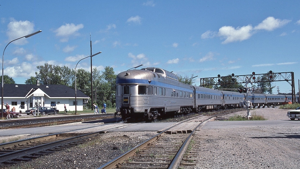 The 'new' * daily  VIA #10,  Toronto section Canadian 
 

 powered by  GMD  F's   6550 / 6624 / 6623   ( ex CP  FP7A   /   ex CN  F9B   /   ex CN  F9B  )  with  11  cars
 

 markers handled by Algonquin Park at CN Washago
 

 At CN Washago, August 11, 1985 Kodachrome by S.Danko
 

 noteworthy,
 

  *  new, initial daylight schedule through Washago June 1 1985
 

 unrebuilt Algonquin Park ( non HEP) sold to Luxury Rail 2004, presently leased to the Tennesee Valley Railroad Museum, Chattanooga TN
 

 more Toronto section
  

  VIA 9 with CP Rail   


 more Washago
  

  first #122 with green flags and CP Rail