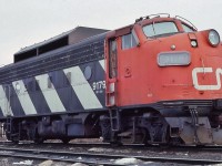 <br>
<br>
 the snow shield provides a strange look....effective ?
 <br>
<br>
  a 1952 GMD product the F7A was rebuilt 1972 to F7Au class CFA-17a, retired by 1989
<br>
<br>
 at Mac Yard, March 8, 1981 Kodachrome by S. Danko
<br>
<br>
 interesting:
 <br>
<br>
 background far left, that is a M420
 <br>
<br>
<a href="http://www.railpictures.ca/?attachment_id= 7382"> snow shield in service  </a>
<br>
<br>
<a href="http://www.railpictures.ca/?attachment_id= 44097"> sans snow shield  </a>
 <br>
<br>
<a href="http://www.railpictures.ca/?attachment_id= 43436"> CN sister w/red snow shield  </a>
 <br>
<br>
 sdfourty
