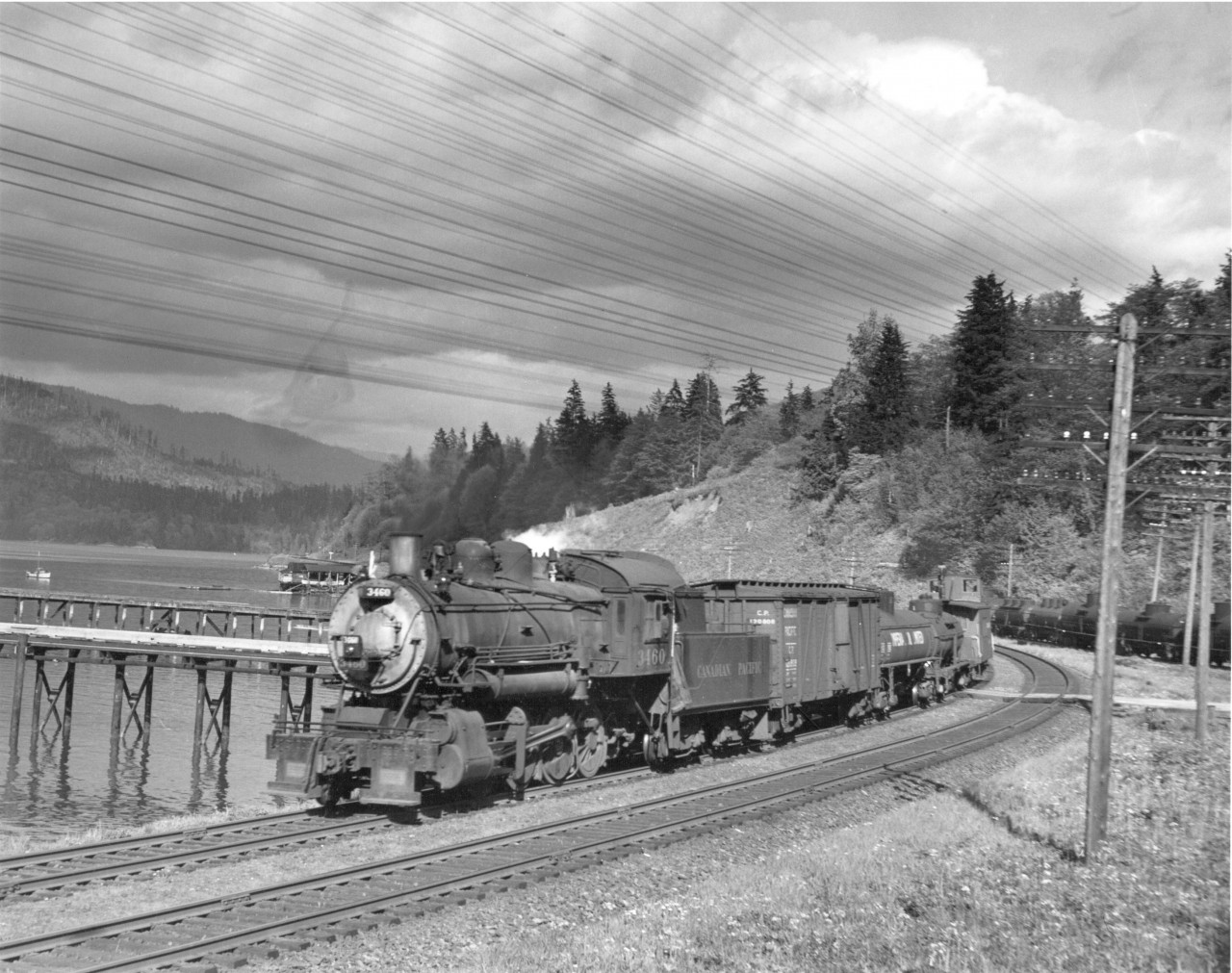 3460 west at Shelburn on Burrard Inlet.  Notice small headlight and footboards at the front.  In the picture my dad took of this engine in 1946 it had a large headlight and a pointed pilot.