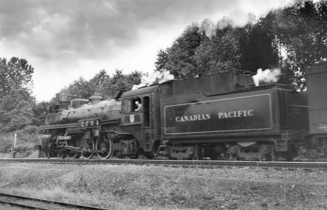 CP 2704 leaving Vancouver with a passenger train.  Following photo shows observation car of same train.