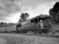 Observation car on unknown passenger train leaving Vancouver.  Engine was 2704 shown in previous photo.