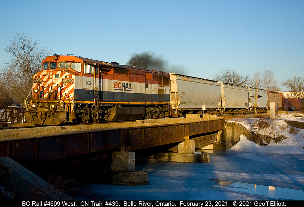 With the light getting low CN train #439 rolls over the Belle River bridge with a solo British Columbia Railway 8-40CM #4609.  As CN is slowing retiring these units it was a treat to get this in decent light.