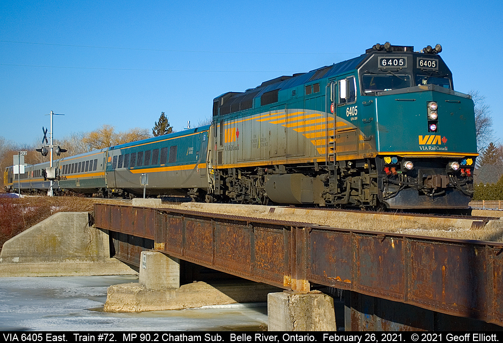 Back to basics.....  Well a heart attack will certainly curb your Railfanning!!  Needless to say I'm staying close to home for a bit until the Dr's give a 'high green' to resume normal life, such that it is in Covid times.  That said, VIA #72 is a nice, for sure, train close to home so I decided to venture out for a few minutes and grab a shot.  Here is VIA #6405, in the standard VIA scheme, in charge of a 4 car #72 with a GE "yellow jacket" on the rear for good measure as they cross Belle River Bridge at MP 90.2 of the VIA Chatham Subdivision on February 26, 2021.