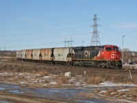 G 80651 22 rolls through Clover Bar with CN 2998 and CN 3156 as the mid train remote on this 174 car train.  Of note, 806 has been filled out with a cut of potash cars bound for Cutarm Saskatchewan. 