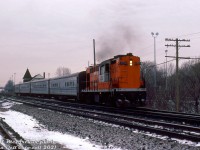 CN RS18 3150 leads a westbound VIA passenger extra with four Tempo cars, chugging away from its stop at Georgetown on the station track and about to re-enter the south main of the Halton Sub.
<br><br>
<i>Bill McArthur photo, Dan Dell'Unto collection slide.</i>
<br><br>
For some GO cab cars laying over that Bill shot on the same visit: <a href=http://www.railpictures.ca/?attachment_id=36457><b>http://www.railpictures.ca/?attachment_id=36457</b></a>