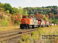 CN Laser 239 climbs up the grade through Dundas during an early fall day with a consist that included; 9669, 5200 and GTW 5900. 