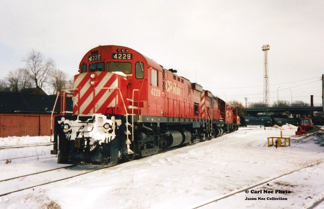 CP 4229, 4239, 8239 and 8243 are viewed idling away during a Saturday morning at CP's Quebec Street yard in London. The units had just come off a westbound junk train after completing their journey on the Galt Subdivision.
