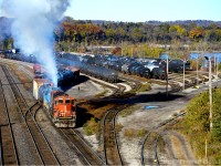CN GP9rm 7032 & GTW 5849 give off a nice smoke show while switching out the yard on this bright and sunny November morning. 08:00 is seen switching out some cars before proceeding to Parkdale. 