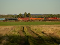 After lifting 5 cars from the BCRY at Utopia, CP 8516 South pulls into the sun and the siding at Baxter for a meet with train 113. 