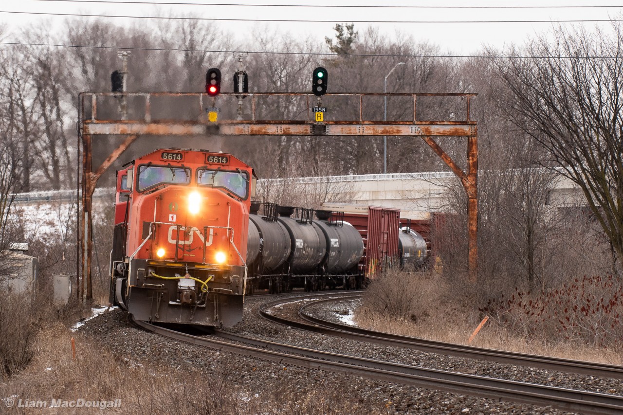 CN 5614 ducks under a pair of block signals at mile 15.5 of the York Sub on the point of M306 with a C40-8W trailing. As I've said before probably, I never take 70i/75i leaders for granted, who knows how long these guys will end up lasting?