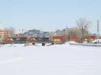 CN 2815 and CN 2534 are the power on CN X105, which has traffic from the Port of Montreal for the west coast as it crosses the Lachine Canal.