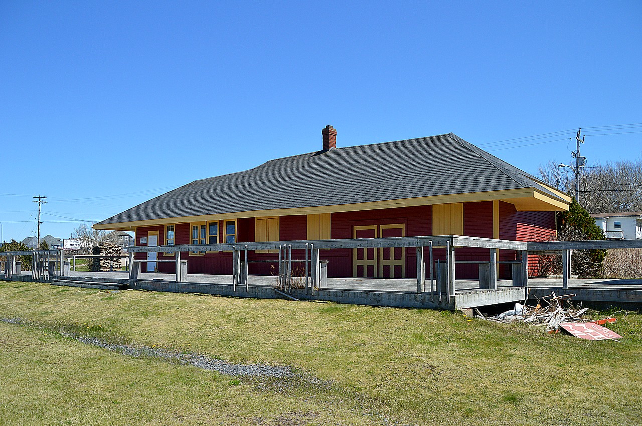 The old railroad station at Inverness Cape Breton. A rare survivor.
Inverness was known for its coal back in the early 1900s. The community received a boost in commerce when the first railroad came to town from Port Hawkesbury back in 1901 in order to service the coal mine(s). Called the Inverness and Richmond Railway, plans were to run thru up the coast to Cheticamp, but it never did make it farther than Inverness.
The coal mines in town were owned by the CNoR. On Feb 1, 1924, the CNR leased the line, then purchased it in 1929.
The coal business eventually was exhausted in the area, and since it was no longer needed, the track from the Causeway at Port Hawkesbury up to Inverness was abandoned in 1986. Track was removed in 1989. It is now the Celtic Shores Coastal Trail.
The station lives on, in great shape, as the area's Mining Museum.