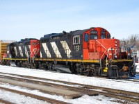 I enjoy taking photos that could have been taken 20-30 years ago.  Today's pair of CN GP9RMs on 580 could have easily been taken 30 years ago, since 4131 was in the last batch of GP9 rebuilds, completed in 1991.  Also noteworthy is the other unit in the consist, 4028, the last of the 4000's in service on CN.  Unfortunately, this consist only lasted a few days.  CN 4131 replaced CN 4770 late last week, and GMTX 2254 arrived in Brantford later in the afternoon to replace 4131 already.  Today was the only day the pair operated in decent sunlight, so I was fortunate that 580's shove back from Normerica coincided with my work schedule.  The GP9RMs look good for being 30 years old; that lead paint has sure held up!
