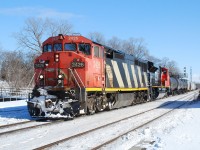 Out of curiosity, I decided to go through my digital photos to see how many photos I have of CN C40-8Ms.  I found some decent photos that I hadn't uploaded, and this is one of them.  The photo was taken 10 years ago less a day, on a nice sunny winter day similar to the weather we're experiencing now.  By my count, at least 13 units of the first order (2400-2429) have been scrapped and 2 active units have been repainted, leaving only 15 C40-8Ms left on the roster in "zebra stripes."  CN 2426 isn't one of them. It was sold in the Fall of 2020 to Martech Industrial in Welland, ON to be cut up like many other Dash-8 variants sent there.  