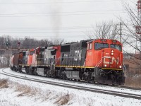 After a short crew change CN G874 throttles up and continues it's journey East on the CN York Subdivision.