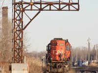Times have certainly changed in the Niagara region. When I first got into serious railfanning in the mid 1990's the region could keep one busy all day, especially with all of the local jobs running around with rebuilt GP9's, GP38's and SW1200 pups. Today four axle power is a rarity on CN rails here. Trillium picked up most of the branches in the late 90's and what was left typically could be handled by the surviving GP set. In 2011 a pair of GP's still often was located at Port Robinson yard, working where needed and when not needed would sit near the yard office much like they did this day. These days a lone six axle unit typically handles all work.