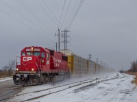 CP 2-240 picks up speed as it Departes Windsor Ontario on route to Toronto from Bensenville IL, experiencing big delays from Christmas and engine problems on the way to Windsor, finally making it on its way.