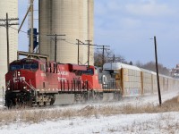 The bitter cold is very apparent as train 241 kicks up fresh powder while storming westward at Streetsville. Trailing unit CN Dash-9 2682 has been a common visitor on CP here over the past few days, so time will tell if it makes it back east again before returning to home rails. The next stop for 241 this day will be Hornby yard to lift a cut of tank cars before moving on.