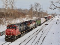 It is always nice catching the older power these days, especially the remaining cowls and original Dash-9's with their unique cabs. Here train 435 passes the switches at Snake after passing Aldershot yard. Significant snowfall has covered the tracks quite a bit with another 20cm on the way.