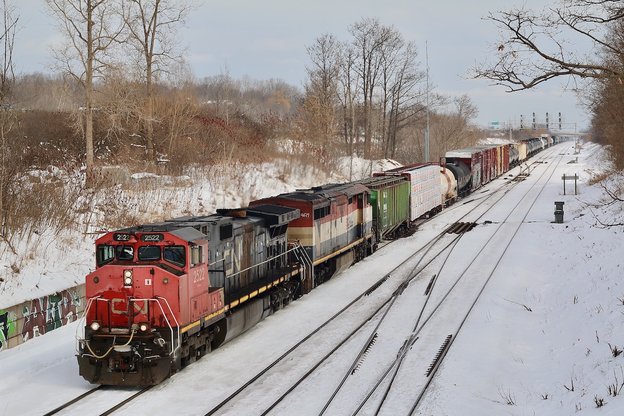 It is always nice catching the older power these days, especially the remaining cowls and original Dash-9's with their unique cabs. Here train 435 passes the switches at Snake after passing Aldershot yard. Significant snowfall has covered the tracks quite a bit with another 20cm on the way.