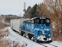 It is no easy task finding interesting photo locations within Brampton. Much of the old CP line to Orangeville is now surrounded by endless housing developments. Not to mention how hard it is to shoot a northbound train when the sun is out. This location just east of the Chinguacousy Rd crossings always caught my eye as it has a small community park on a hillside overlooking a small creek along the right of way. Unfortunately there is no hiding that ugly cell tower. My goal this year is to try to find as many new locations along the line before its possible demise next year. While MP15 333 may not be the most exciting to look at compared to the GP9's of the past, I am going for scenery over motive power. This line has such a deep history, It has been sad watching it fade. Here the two man crew give a friendly wave as the dig into the slight grade with seven cars pulling on the drawbar. Needless to say the sound at least was impressive. 