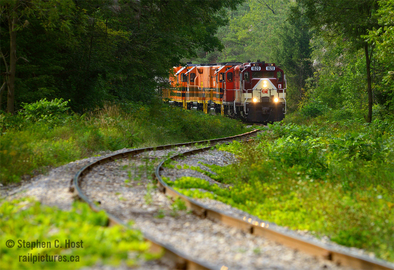 Snaking around the S curve in Corhwin Ontario, on OSR's second last day servicing Guelph, Job 1 is southbound with new GWRR power in tow in preparation for the takeover that coming weekend.