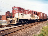 Looking tired and worn, TH&B 73 is leaving Port Colborne with a decent consist of mixed freight from various industries and is now on the return trip back to Welland Yard.  She would live on a couple of more years in TH&B colours before being chopped down and reassigned to CP as 1683. Originally running into Port from Welland's Coyle Yard through Welland Junction (Dain City), the trip back to Welland Yard would take her through the Townline Tunnel underneath the Welland Canal.  