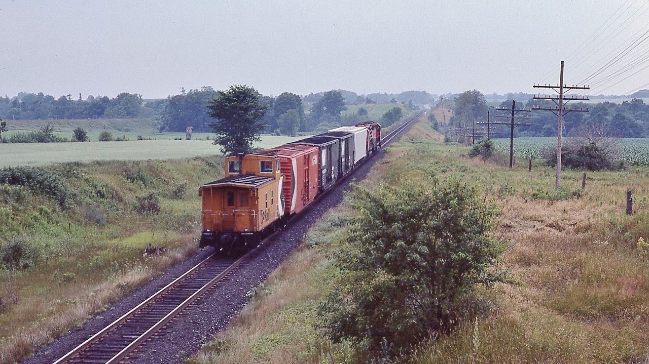 Green eye on approach Lovekin ( Wesleyville side road) 


  Two SD40's,  5542 – 55xx,   on the Cobourg Turn high ball for Agincourt


  On a hot, humid, hazy, sticky, sweaty July 25, 1982, afternoon, Kodachrome by S.Danko 


  noteworthy: Cobourg Turn always has interesting power, whatever is available at Agincourt: SD's, TH&B geeps, GMD GP-38, MLW RS-10, to a single MLW RS-3


  sdfourty