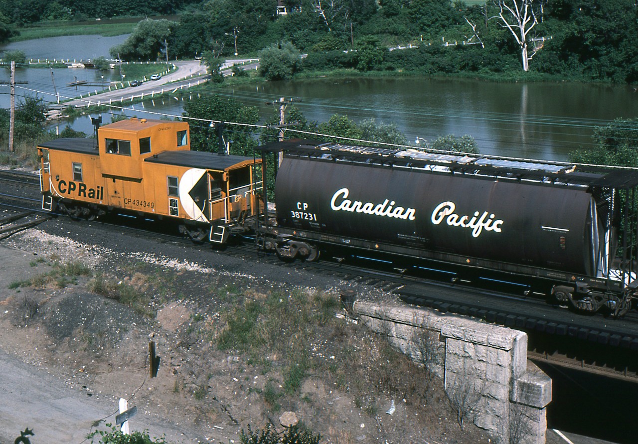 This is the Toronto-Hamilton main that is part of the wye junction called Bayview. This picture shows the caboose at the end of a Canadian Pacific westbound freight headed to Hamilton. Railroads were starting to eliminate cabooses in the United States at this rime. Canadian railroads would do this very soon.