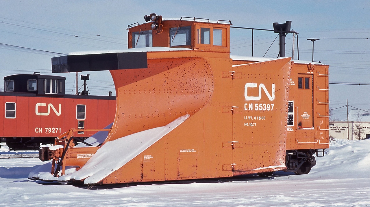 built in 1935 by National Steel Car,  Trackside Guide 2018 indicates plow 55397 is serviceable


 Hawker Siddeley 1967 built caboose 79271 was off the roster by 1991


 Plow searching at London January 17, 1981 Kodachrome by S.Danko