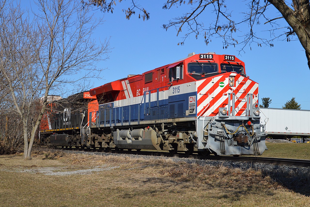 Beautiful day and an interesting #421 got the fans out this morning!! CN 3115, the BC Rail heritage unit, led CN 2909 down the Niagara Peninsula much to the delight of the fans, who were a rather rambunctious lot this morning.
This image was shot around 1000 hrs. Long train had a CN "100" yrs #3876  mid-train engine as well.